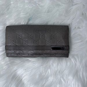 Gucci Guccissima Leather Wallet.